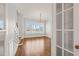 Sun-filled foyer featuring hardwood floors, paneled walls, and natural light at 40 Park Meadow Ln, Youngsville, NC 27596