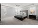 Spacious main bedroom with tray ceiling, plush carpet, and ample natural light at 40 Park Meadow Ln, Youngsville, NC 27596