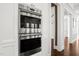 Built-in stainless steel double ovens and custom cabinetry in a modern kitchen at 40 Park Meadow Ln, Youngsville, NC 27596