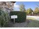 A sign at the property entrance signifies a private community, with manicured shrubbery nearby at 40 Park Meadow Ln, Youngsville, NC 27596