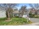 Exterior of a single-Gathering home with a well-manicured lawn and landscaping at 409 Hanson Rd, Durham, NC 27713