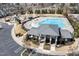 An aerial shot captures the community pool, playground, and clubhouse at 420 Retreat Ln, Wake Forest, NC 27587