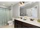 Full bathroom with double vanity, good lighting, and shower-tub combination at 420 Retreat Ln, Wake Forest, NC 27587