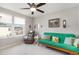 Cozy bedroom with bright window, ceiling fan, and space for a bed and seating at 420 Retreat Ln, Wake Forest, NC 27587