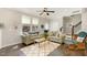 Cozy living room with comfortable seating, hardwood floors, and a sunlit window creating a welcoming atmosphere at 420 Retreat Ln, Wake Forest, NC 27587