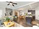 Spacious living area seamlessly connecting the living room, kitchen, and dining area, perfect for modern living at 420 Retreat Ln, Wake Forest, NC 27587