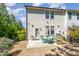 A cozy patio area with a table and chairs offers an outdoor dining and relaxation space at 420 Retreat Ln, Wake Forest, NC 27587