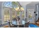 Dining area featuring lots of natural light, and access to the back yard at 4225 Old Lewis Farm Rd, Raleigh, NC 27604