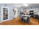 Spacious kitchen featuring an island, stainless steel appliances and hardwood floors at 4225 Old Lewis Farm Rd, Raleigh, NC 27604