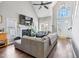 Bright living room with high ceilings, fireplace, and view of the front door at 4429 Gallatree Ln, Raleigh, NC 27616