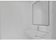 Modern bathroom featuring a sleek sink with a contemporary mirror and minimalist design at 4810 Gossamer Ln # 105, Raleigh, NC 27616