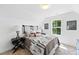 Bright bedroom featuring a modern design with neutral colors and natural light at 4810 Gossamer Ln # 105, Raleigh, NC 27616