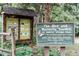 An informational sign marks the location of the bird and butterfly garden at 4810 Gossamer Ln # 105, Raleigh, NC 27616