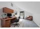 Well-lit home office featuring a large desk, comfortable chair, and ample storage space for productivity at 4905 Will-O-Dean Rd, Raleigh, NC 27616