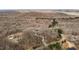 Breathtaking aerial view of wooded landscape showcasing scattered homesites along winding roads at 5507 Eagles Nest Trl, Snow Camp, NC 27349