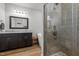 Bathroom featuring walk-in shower, soaking tub, and double vanity sinks at 5507 Eagles Nest Trl, Snow Camp, NC 27349
