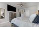 Comfortable bedroom with walk-in closet, ceiling fan, and dresser at 5507 Eagles Nest Trl, Snow Camp, NC 27349