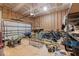 Spacious unfinished garage with ample storage, bikes, and work area at 5507 Eagles Nest Trl, Snow Camp, NC 27349