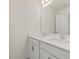 Bathroom features a white double vanity with a large mirror and contemporary fixtures at 553 Winding Creek Dr, Lillington, NC 27546