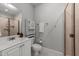 Bathroom featuring a vanity with sink, toilet, storage cabinet, and shower at 5714 Belmont Valley Ct, Raleigh, NC 27612