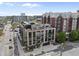 Aerial view of brick apartment buildings with balconies at 615 W Peace St # 301, Raleigh, NC 27605