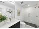 Elegant bathroom features a glass shower, sleek black vanity, and contemporary fixtures at 615 W Peace St # 301, Raleigh, NC 27605