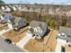 An aerial view of a charming two-story home with a landscaped yard and an attached two car garage at 63 Capewood Ct, Garner, NC 27529