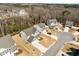 Aerial view of neighborhood with mature trees and houses at 63 Capewood Ct, Garner, NC 27529