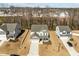 An aerial view of a charming two-story home with a landscaped yard and an attached two car garage at 63 Capewood Ct, Garner, NC 27529