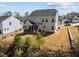 Expansive backyard features a screened porch and play area at 63 Capewood Ct, Garner, NC 27529