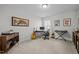 Bedroom features a workstation with guitars and musical instruments creating an inspirational space at 63 Capewood Ct, Garner, NC 27529