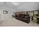 Home theater setup with leather recliners and wall decor for an immersive viewing experience at 63 Capewood Ct, Garner, NC 27529