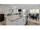 Open concept kitchen with granite countertops connects to a cozy living and dining area at 63 Capewood Ct, Garner, NC 27529