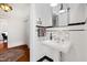 Classic bathroom with pedestal sink, tile accents, and modern fixtures at 632 E Franklin St, Raleigh, NC 27604