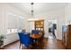 Dining area featuring a wooden table, chairs, and a stylish light fixture at 632 E Franklin St, Raleigh, NC 27604