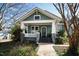 Charming craftsman home featuring a welcoming front porch and well-maintained landscaping at 632 E Franklin St, Raleigh, NC 27604