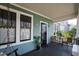 Charming front porch with seating and a view of the neighborhood, creating a welcoming entrance to the home at 632 E Franklin St, Raleigh, NC 27604
