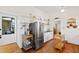 Spacious kitchen features stainless steel appliances, hardwood floors, and ample storage at 632 E Franklin St, Raleigh, NC 27604
