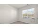 Bright bedroom featuring a large window that lets in plenty of natural light at 71 Hawksmoore Ln, Lillington, NC 27546