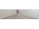 Hallway featuring carpet, white walls and doors at 71 Hawksmoore Ln, Lillington, NC 27546