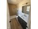 Modern bathroom features stylish vanity, walk in shower and tiled floor at 82 Cool Creek Dr, Willow Springs, NC 27592