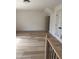 Expansive bonus room featuring wood flooring and bright natural light at 82 Cool Creek Dr, Willow Springs, NC 27592