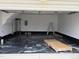 Clean, organized garage with epoxy flooring and ample storage space at 82 Cool Creek Dr, Willow Springs, NC 27592
