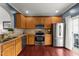 Spacious kitchen with stainless steel appliances and ample cabinet space at 917 Hamlet Park Dr, Morrisville, NC 27560