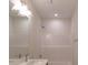 Bright and clean bathroom with a shower-tub combo and modern vanity at 9231 Bear Run Ln, Middlesex, NC 27557