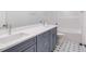 Bathroom featuring double sink vanity and tile floor at 9231 Bear Run Ln, Middlesex, NC 27557