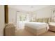 Bright and cozy bedroom with a large window, neutral colors, and modern decor at 9231 Bear Run Ln, Middlesex, NC 27557
