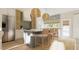Stylish kitchen with stone countertops, a subway tile backsplash, and stainless steel appliances at 9231 Bear Run Ln, Middlesex, NC 27557