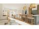 Bright and airy living space with a view of the dining area, kitchen, and inviting decor at 9231 Bear Run Ln, Middlesex, NC 27557