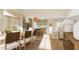 Spacious open floorplan combines living and dining areas with a kitchen bar and contemporary decor at 9231 Bear Run Ln, Middlesex, NC 27557